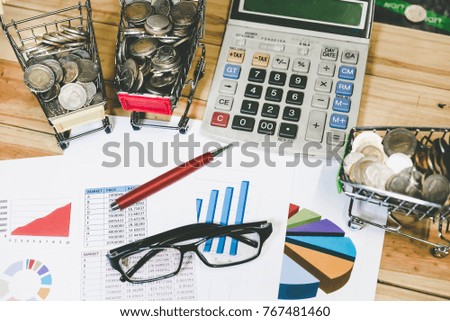 Personal financial planning concept. Businessman workplace with papers for financial planning. Business people discussing the charts and graphs showing the results of successful financial planning.