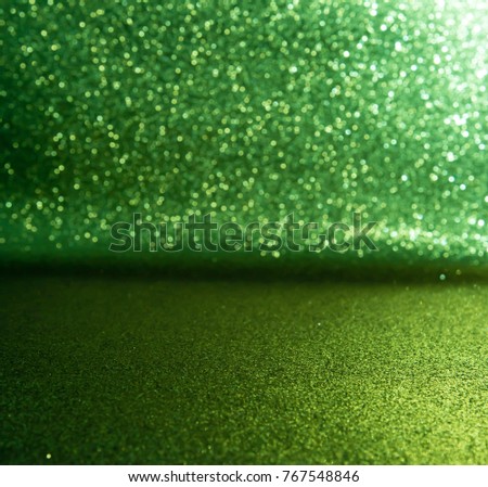 green glitter lights background. defocused