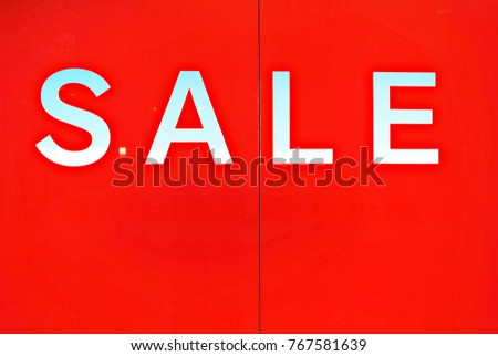 sale sign on store window