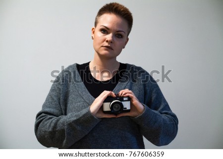 Photographer and her lovely photo film camera. Love photography