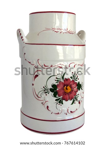 Vintage porcelain milk can with floral decorations isolated on white