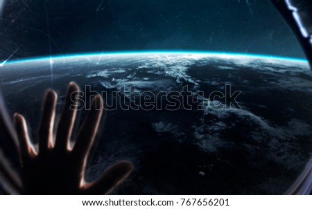View of Earth planet from spaceship or space station. Elements of this image furnished by NASA