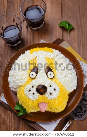 Salad in a shape of a funny dog. The idea for a delicious and merry holidays
