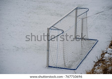 soccer field covered with snow