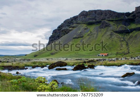 The picturesque icelandic view on the waterfall and mountains. Iceland. Background.