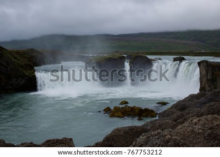 The picturesque icelandic view on the waterfall and mountains. Iceland. Background.