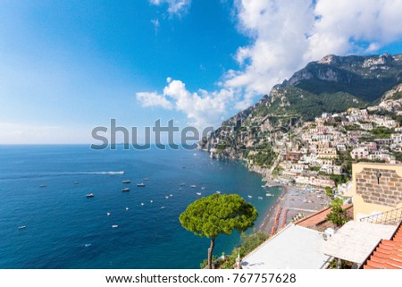 Beautiful Positano, with the beach in the mediterranean sea at summer in Amalfi Coast, Italy.