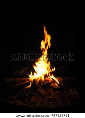 Campfire at night. Freedom, travel, tourism, holidays, nature, living, ritual concept.