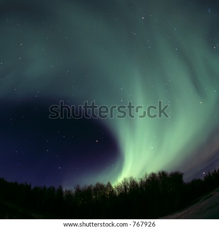 Northern lights rolling out on the sky