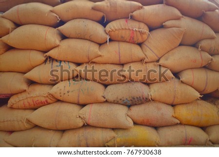 Jute bag in store containing grains Royalty-Free Stock Photo #767930638