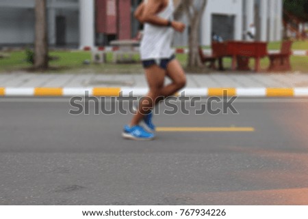 Blurred Photo of men being Running exercise on street park outdoor
