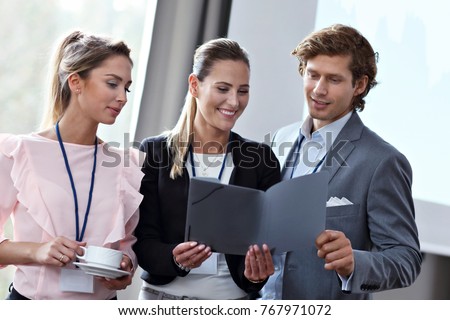 Picture showing business people having a conference