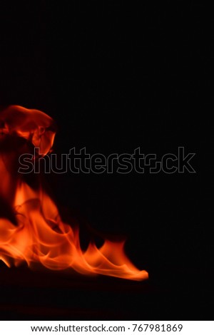 Abstract Fire flames isolated on black background

