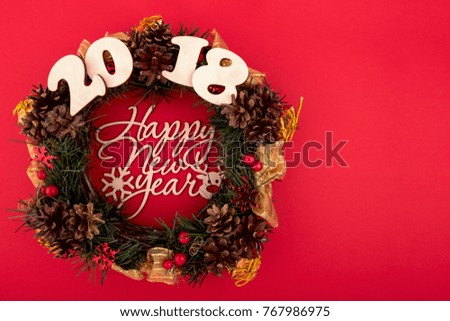 Christmas Wreath, Holiday Composition on a Red Background. Top View