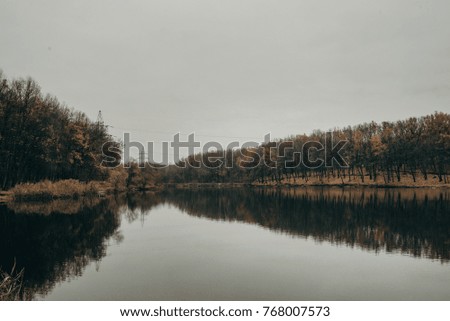 Dramatic lake. Colorful autumn morning. Around the world. Toned adventure photo. Artistic style post processed photo.
