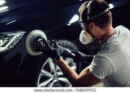 series of detailed cars: Polishing a car Royalty-Free Stock Photo #768009952