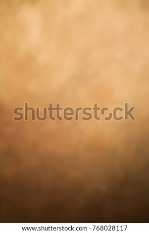 foto a colori verticale  sfondo marrone sfumato Royalty-Free Stock Photo #768028117