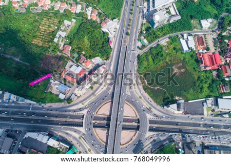 Transport circular green tree junction traffic road with car aerial view