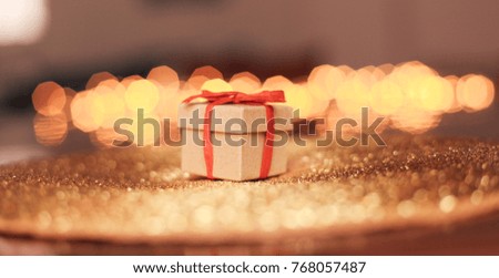 Gift box, christmas bokeh on background
