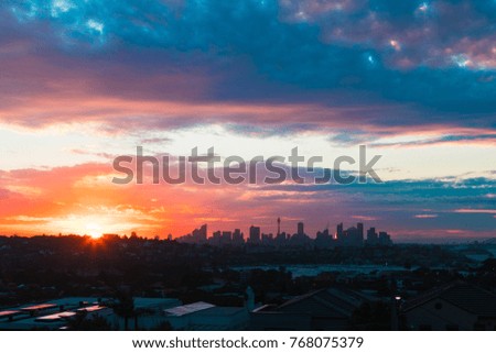 Sunset view of Sydney skyline on a distance.