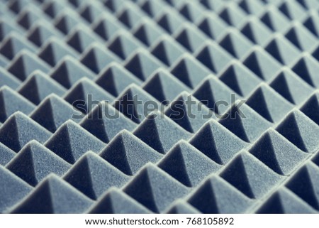 Acoustic foam panel background, blue toned image