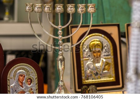 Menorah and christian icons on the market