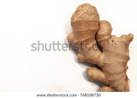 Fresh ginger on white background, herb medical concept. On white table. Top View,copy space. Fresh ginger root or rhizome isolated. Herb and spice