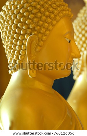 The side face of the Buddha in the temple.