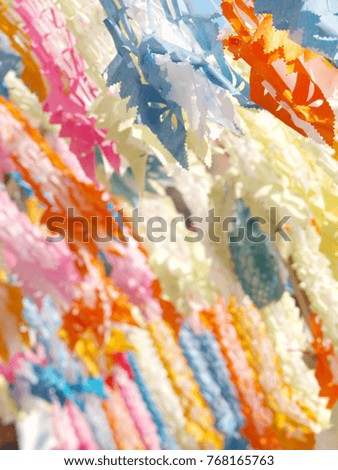 crop closeup on colorful pastel tone hand crafted paper decoration elements handmade vintage style for use as street decoration in LOY KRATHONG festival in THAILAND