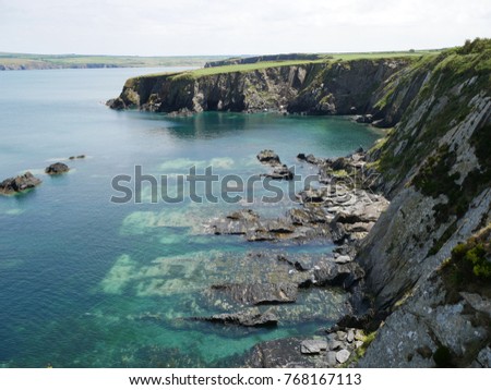 A wave cut platform on the Pembrokeshire coast in South Wales, UK. Royalty-Free Stock Photo #768167113