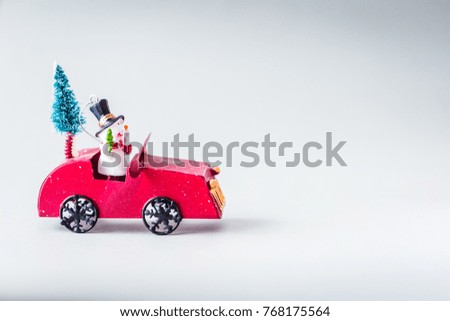 Christmas Tree with Snowman on Red Toy Car, Merry Christmas Concept, Free Space for Text