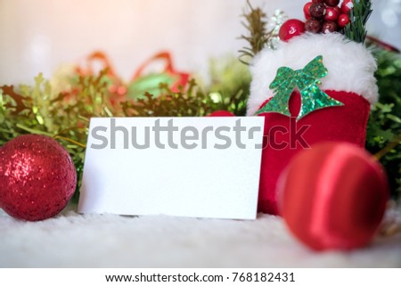 Mockup image of white blank name card with christmas decorations on wooden background