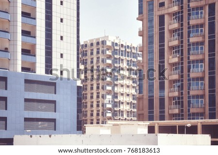 Close up picture of residential buildings facades, architectural background, color toned picture, Dubai.