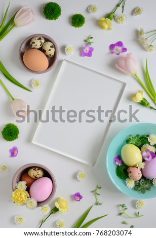 Easter greeting card or invitation leaflet tempate with a space for a text, flat lay arrangement, view from above