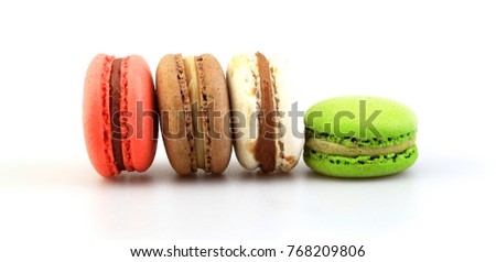 Sweet and colourful french macaroons or macarons on white background, Dessert.