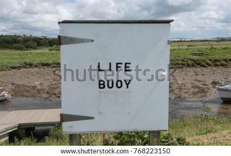 "Life Buoy" Written on a Wooden Cabinet at Vellator Quay in Braunton  on the South West Coast Path in Rural Devon, England, UK