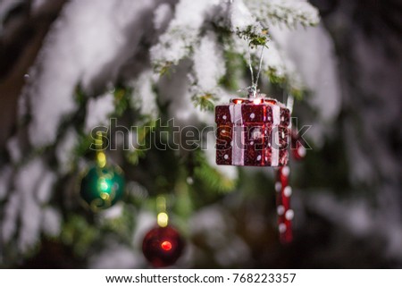 Christmas decorations on a fir tree, with snowflakes, mild light, gifts on a fir tree, Santa Claus come to me