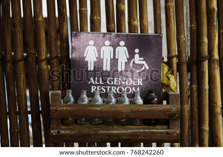 restroom sign in the park.