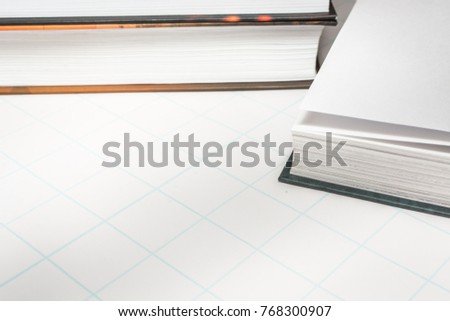 School books for education on white paper.