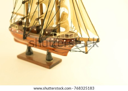 Barque ship gift craft model wooden on white background. select focus.