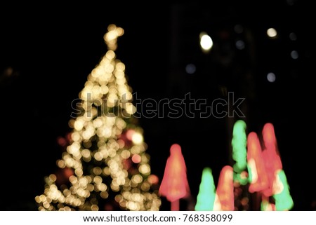 Xmas lighting festival with xmas tree and green and red lighting installation