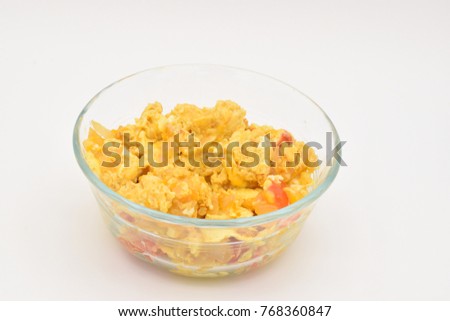 Scrambled Eggs in a Glass Dish on a White Background