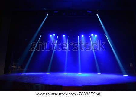 the rays of light on a dark background Royalty-Free Stock Photo #768387568