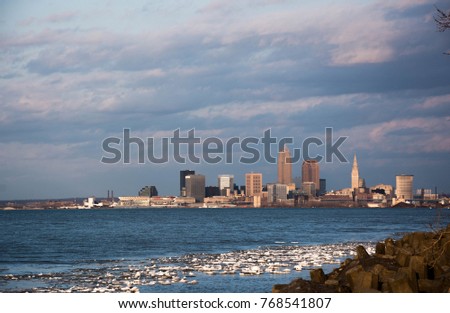 Cleveland skyline in winter with icebergs in Lake Erie