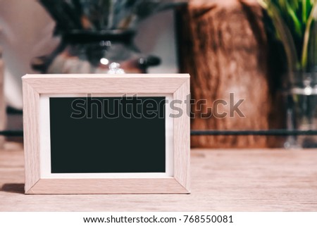 label or Blank picture frame template set for Photo or picture painting art gallery in interior on the table. acrylic tent card Used for Menu Bar and restaurant or put everything into it . mockup 