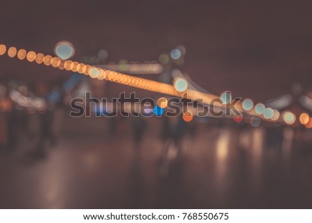 blur night background of people on London famous place at night