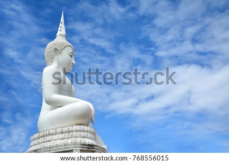 White Buddha background, blue sky