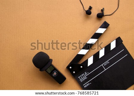 Clapboard,Sound recorder,lavalier microphone copy space in Video creator and Filmmaker concept 