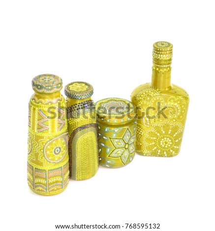 many different bottles, painted dot painted on isolated background. Creative painting.