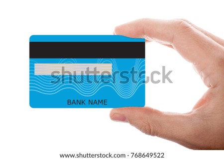 Hand holding credit card isolated on white background